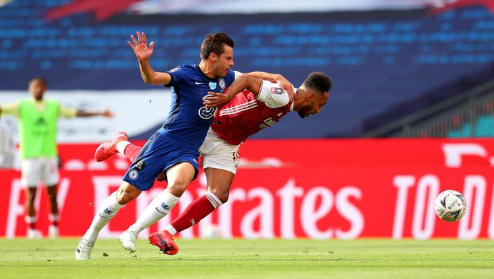 LONDON, ENGLAND - AUGUST 01: Cesar Azpilicueta of Chelsea fouls Pierre-Emerick Aubameyang of Arsenal which leads to Arsenal being awarded a penalty during the Heads Up FA Cup Final match between Arsenal and Chelsea at Wembley Stadium on August 01, 2020 in London, England. Football Stadiums around Europe remain empty due to the Coronavirus Pandemic as Government social distancing laws prohibit fans inside venues resulting in all fixtures being played behind closed doors. (Photo by Catherine Ivill/Getty Images) LONDON, ENGLAND - AUGUST 01: Cesar Azpilicueta of Chelsea fouls Pierre-Emerick Aubameyang of Arsenal which leads to Arsenal being awarded a penalty during the Heads Up FA Cup Final match between Arsenal and Chelsea at Wembley Stadium on August 01, 2020 in London, England. Football Stadiums around Europe remain empty due to the Coronavirus Pandemic as Government social distancing laws prohibit fans inside venues resulting in all fixtures being played behind closed doors. (Photo by Catherine Ivill/Getty Images)