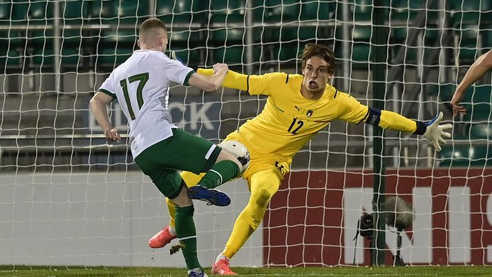 TALLAGHT, IRELAND - NOVEMBER 12: Ross Tierney of Republic of Ireland sees his shot saved by Marco Carnesecchi of Italy during the UEFA European U21 Championship Qualifier between Republic of Ireland and Italy at Tallaght Stadium on November 12, 2021 in Tallaght, Ireland. (Photo by Charles McQuillan/Getty Images) TALLAGHT, IRELAND - NOVEMBER 12: Ross Tierney of Republic of Ireland sees his shot saved by Marco Carnesecchi of Italy during the UEFA European U21 Championship Qualifier between Republic of Ireland and Italy at Tallaght Stadium on November 12, 2021 in Tallaght, Ireland. (Photo by Charles McQuillan/Getty Images)