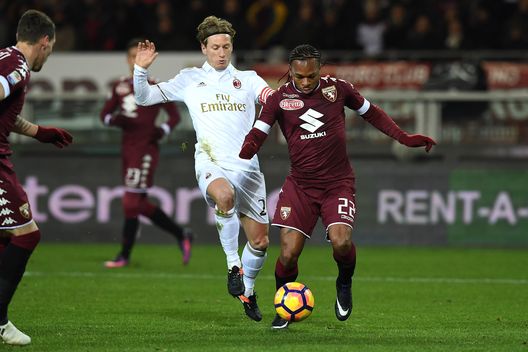 TURIN, ITALY - JANUARY 16: Joel Chukwuma Obi (R) of FC Torino competes with Ignazio Abate of AC Milan during the Serie A match between FC Torino and AC Milan at Stadio Olimpico di Torino on January 16, 2017 in Turin, Italy. (Photo by Valerio Pennicino/Getty Images) TURIN, ITALY - JANUARY 16: Joel Chukwuma Obi (R) of FC Torino competes with Ignazio Abate of AC Milan during the Serie A match between FC Torino and AC Milan at Stadio Olimpico di Torino on January 16, 2017 in Turin, Italy. (Photo by Valerio Pennicino/Getty Images)