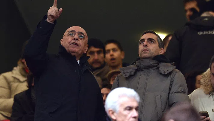 MILAN, ITALY - JANUARY 20: Vice President and CEO of Milan Adriano Gaglliani (L) gestures to his son Gianluca Galliani (R) looks on before the Serie A match between AC Milan and Bologna FC at San Siro Stadium on January 20, 2013 in Milan, Italy. (Photo by Tullio M. Puglia/Getty Images)