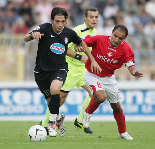 PIACENZA, ITALY - SEPTEMBER 30: Luigi Riccio of Piacenza (R) and Matteo Paro of Juventus in action during the Serie B match between Piacenza and Juventus at the Stadio Leonardo Garilli on September 30, 2006 in Piacenza, Italy. (Photo by New Press/Getty Images) PIACENZA, ITALY - SEPTEMBER 30: Luigi Riccio of Piacenza (R) and Matteo Paro of Juventus in action during the Serie B match between Piacenza and Juventus at the Stadio Leonardo Garilli on September 30, 2006 in Piacenza, Italy. (Photo by New Press/Getty Images)