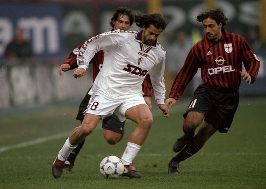  12 Dec 1999: Gianluigi Lentini of Torino is closed down by the AC Milan defence during the Italian Serie A match played at the San Siro in Milan, Italy. The game finished in a 2-0 win for Milan. Mandatory Credit: Claudio Villa /Allsport 