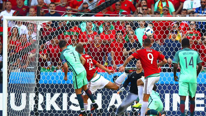 LYON, FRANCE - JUNE 22: Cristiano Ronaldo (1st L) of Portugal heads the ball to score his team's third goal during the UEFA EURO 2016 Group F match between Hungary and Portugal at Stade des Lumieres on June 22, 2016 in Lyon, France. (Photo by Julian Finney/Getty Images) LYON, FRANCE - JUNE 22: Cristiano Ronaldo (1st L) of Portugal heads the ball to score his team's third goal during the UEFA EURO 2016 Group F match between Hungary and Portugal at Stade des Lumieres on June 22, 2016 in Lyon, France. (Photo by Julian Finney/Getty Images)