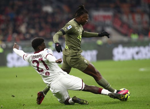 MILAN, ITALY - FEBRUARY 10: Rafael Leão of AC Milan is challenged by Ndary Adopo of Torino during the Serie A match between AC MIlan and Torino FC at Stadio Giuseppe Meazza on February 10, 2023 in Milan, . (Photo by Marco Luzzani/Getty Images)