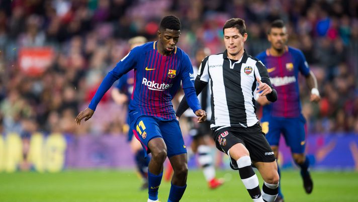 BARCELONA, SPAIN - JANUARY 07:  Ousmane Dembele of FC Barcelona conducts the ball under pressure from Sasa Lukic of Levante UD during the La Liga match between Barcelona and Levante at Camp Nou on January 7, 2018 in Barcelona, Spain.  (Photo by Alex Caparros/Getty Images) 