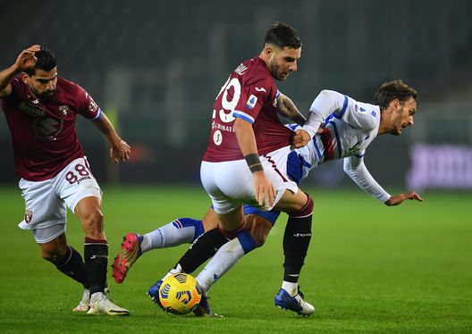 TURIN, ITALY - NOVEMBER 30: Nicola Murru of Torino F.C. battles for possession with Manolo Gabbiadini of U.C. Sampdoria during the Serie A match between Torino FC and UC Sampdoria at Stadio Olimpico di Torino on November 30, 2020 in Turin, Italy. Sporting stadiums around Italy remain under strict restrictions due to the Coronavirus Pandemic as Government social distancing laws prohibit fans inside venues resulting in games being played behind closed doors. (Photo by Valerio Pennicino/Getty Images) TURIN, ITALY - NOVEMBER 30: Nicola Murru of Torino F.C. battles for possession with Manolo Gabbiadini of U.C. Sampdoria during the Serie A match between Torino FC and UC Sampdoria at Stadio Olimpico di Torino on November 30, 2020 in Turin, Italy. Sporting stadiums around Italy remain under strict restrictions due to the Coronavirus Pandemic as Government social distancing laws prohibit fans inside venues resulting in games being played behind closed doors. (Photo by Valerio Pennicino/Getty Images)