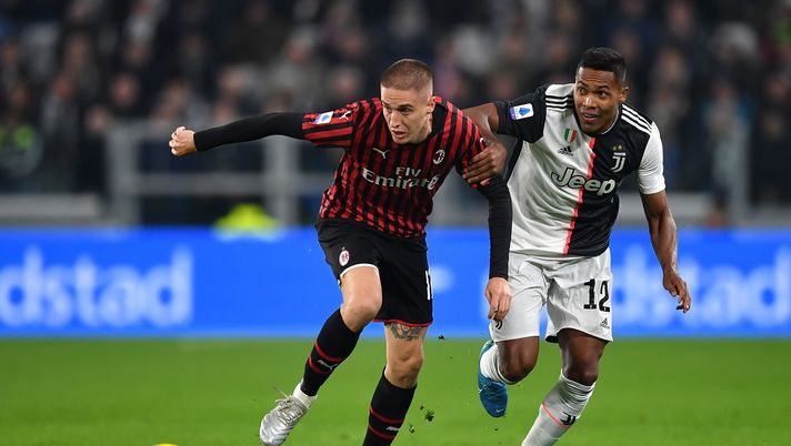 Andrea Conti ed Alex Sandro durante Juventus-Milan (credits: GETTY Images) 