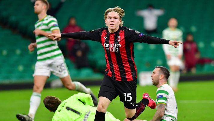 GLASGOW, SCOTLAND - OCTOBER 22: Jens Petter Hauge of AC Milan celebrates after scoring his sides third goal during the UEFA Europa League Group H stage match between Celtic and AC Milan at Celtic Park on October 22, 2020 in Glasgow, Scotland. Sporting stadiums around the UK remain under strict restrictions due to the Coronavirus Pandemic as Government social distancing laws prohibit fans inside venues resulting in games being played behind closed doors. (Photo by Mark Runnacles/Getty Images) GLASGOW, SCOTLAND - OCTOBER 22: Jens Petter Hauge of AC Milan celebrates after scoring his sides third goal during the UEFA Europa League Group H stage match between Celtic and AC Milan at Celtic Park on October 22, 2020 in Glasgow, Scotland. Sporting stadiums around the UK remain under strict restrictions due to the Coronavirus Pandemic as Government social distancing laws prohibit fans inside venues resulting in games being played behind closed doors. (Photo by Mark Runnacles/Getty Images)