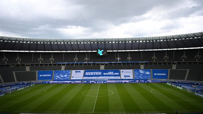 BERLIN, GERMANY - MAY 15: A general view inside the stadium prior to the Bundesliga match between Hertha BSC and 1. FC Koeln at Olympiastadion on May 15, 2021 in Berlin, Germany. Sporting stadiums around Germany remain under strict restrictions due to the Coronavirus Pandemic as Government social distancing laws prohibit fans inside venues resulting in games being played behind closed doors. (Photo by Soeren Stache - Pool/Getty Images) BERLIN, GERMANY - MAY 15: A general view inside the stadium prior to the Bundesliga match between Hertha BSC and 1. FC Koeln at Olympiastadion on May 15, 2021 in Berlin, Germany. Sporting stadiums around Germany remain under strict restrictions due to the Coronavirus Pandemic as Government social distancing laws prohibit fans inside venues resulting in games being played behind closed doors. (Photo by Soeren Stache - Pool/Getty Images)