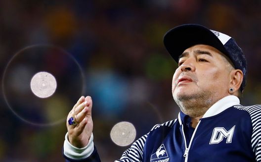 BUENOS AIRES, ARGENTINA - MARCH 07: Diego Armando Maradona head coach of Gimnasia y Esgrima La Plata blows a kiss to fans before a match between Boca Juniors and Gimnasia y Esgrima La Plata as part of Superliga 2019/20 at Alberto J. Armando Stadium on March 7, 2020 in Buenos Aires, Argentina. (Photo by Marcos Brindicci/Getty Images) BUENOS AIRES, ARGENTINA - MARCH 07: Diego Armando Maradona head coach of Gimnasia y Esgrima La Plata blows a kiss to fans before a match between Boca Juniors and Gimnasia y Esgrima La Plata as part of Superliga 2019/20 at Alberto J. Armando Stadium on March 7, 2020 in Buenos Aires, Argentina. (Photo by Marcos Brindicci/Getty Images)