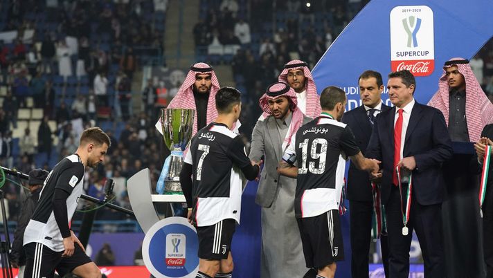 RIYADH, SAUDI ARABIA - DECEMBER 22: Lega Serie A CEO Luigi De Siervo presents Juventus players with their medals during the medal ceremony after the Italian Supercup match between Juventus and SS Lazio at King Saud University Stadium on December 22, 2019 in Riyadh, Saudi Arabia. (Photo by Claudio Villa/Getty Images for Lega Serie A) RIYADH, SAUDI ARABIA - DECEMBER 22: Lega Serie A CEO Luigi De Siervo presents Juventus players with their medals during the medal ceremony after the Italian Supercup match between Juventus and SS Lazio at King Saud University Stadium on December 22, 2019 in Riyadh, Saudi Arabia. (Photo by Claudio Villa/Getty Images for Lega Serie A)