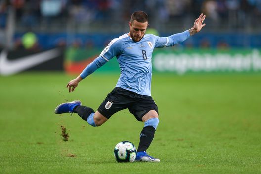 PORTO ALEGRE, BRAZIL - JUNE 20: Nahitan Nández of Uruguay kicks the ball during the Copa America Brazil 2019 group C match between Uruguay and Japan at Arena do Gremio on June 20, 2019, in Porto Alegre, Brazil. (Photo by Lucas Uebel/Getty Images) 
