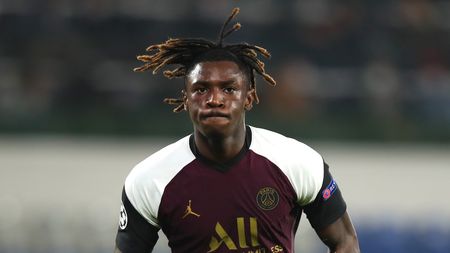 ISTANBUL, TURKEY - OCTOBER 28: Moise Kean of Paris Saint-Germain celebrates after scoring his sides second goal during the UEFA Champions League Group H stage match between Istanbul Basaksehir and Paris Saint-Germain at Basaksehir Fatih Terim Stadyumu on October 28, 2020 in Istanbul, Turkey. Sporting stadiums around Turkey remain under strict restrictions due to the Coronavirus Pandemic as Government social distancing laws prohibit fans inside venues resulting in games being played behind closed doors. (Photo by Tolga Bozoglu - Pool/Getty Images)