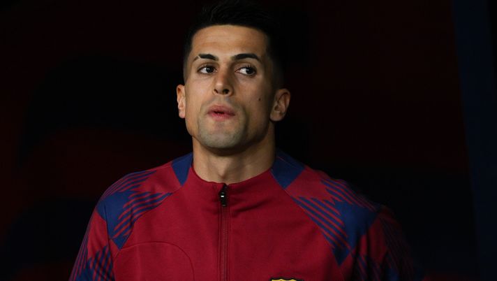 BARCELONA, SPAIN - DECEMBER 10: Joao Cancelo of FC Barcelona looks on prior to the LaLiga EA Sports match between FC Barcelona and Girona FC at Estadi Olimpic Lluis Companys on December 10, 2023 in Barcelona, Spain. (Photo by David Ramos/Getty Images) cancelo barcellona napoli