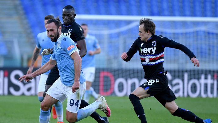 ROME, ITALY - FEBRUARY 20: Vedat Muriqi of SS Lazio compete for the ball with Mikkel Damsgaard of UC Sampdoria during the Serie A match between SS Lazio and UC Sampdoria at Stadio Olimpico on February 20, 2021 in Rome, Italy. Sporting stadiums around Italy remain under strict restrictions due to the Coronavirus Pandemic as Government social distancing laws prohibit fans inside venues resulting in games being played behind closed doors. (Photo by Marco Rosi - SS Lazio/Getty Images) ROME, ITALY - FEBRUARY 20: Vedat Muriqi of SS Lazio compete for the ball with Mikkel Damsgaard of UC Sampdoria during the Serie A match between SS Lazio and UC Sampdoria at Stadio Olimpico on February 20, 2021 in Rome, Italy. Sporting stadiums around Italy remain under strict restrictions due to the Coronavirus Pandemic as Government social distancing laws prohibit fans inside venues resulting in games being played behind closed doors. (Photo by Marco Rosi - SS Lazio/Getty Images)