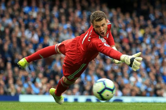 MANCHESTER, ENGLAND - SEPTEMBER 15: Fulham goalkeeper Marcus Bettinelli dives for the ball during the Premier League match between Manchester City and Fulham at the Etihad Stadium on September 15, 2018 in Manchester, England. (Photo by Simon Stacpoole/Offside/Getty Images) MANCHESTER, ENGLAND - SEPTEMBER 15: Fulham goalkeeper Marcus Bettinelli dives for the ball during the Premier League match between Manchester City and Fulham at the Etihad Stadium on September 15, 2018 in Manchester, England. (Photo by Simon Stacpoole/Offside/Getty Images)