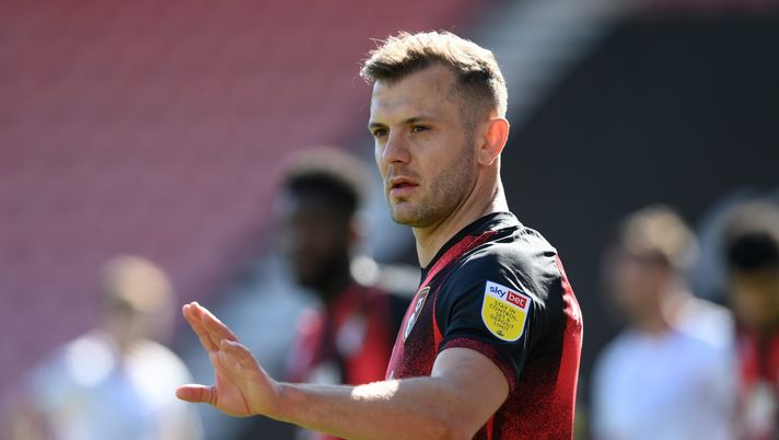 BOURNEMOUTH, ENGLAND - APRIL 02: Jack Wilshere of Bournemouth looks on during the Sky Bet Championship match between AFC Bournemouth and Middlesbrough at Vitality Stadium on April 02, 2021 in Bournemouth, England. Sporting stadiums around the UK remain under strict restrictions due to the Coronavirus Pandemic as Government social distancing laws prohibit fans inside venues resulting in games being played behind closed doors. (Photo by Mike Hewitt/Getty Images) Wilshere e gli altri: i giocatori che hanno lasciato il calcio… ancora troppo giovani- immagine 2