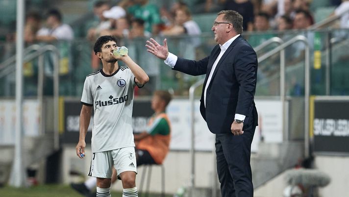 WARSAW, POLAND - JULY 14: (L) Czeslaw Michniewicz trainer coach of Legia Warsaw gestures during Legia Warsaw v Bodo/Glimt - UEFA Champions League 2021/22 First Qualifying Round Second Leg at Marshal Jozef Pilsudski Legia Warsaw Municipal Stadium on July 14, 2021 in Warsaw, Poland. (Photo by Adam Nurkiewicz/Getty Images) WARSAW, POLAND - JULY 14: (L) Czeslaw Michniewicz trainer coach of Legia Warsaw gestures during Legia Warsaw v Bodo/Glimt - UEFA Champions League 2021/22 First Qualifying Round Second Leg at Marshal Jozef Pilsudski Legia Warsaw Municipal Stadium on July 14, 2021 in Warsaw, Poland. (Photo by Adam Nurkiewicz/Getty Images)