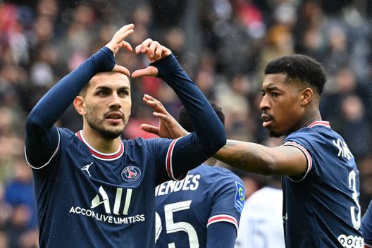 Paris Saint-Germain's Argentinian midfielder Leandro Paredes (L) celebrates scoring his team's third goal during the French L1 football match between Paris-Saint Germain (PSG) and Girondins de Bordeaux at The Parc des Princes Stadium, in Paris on March 13, 2022. (Photo by Alain JOCARD / AFP) (Photo by ALAIN JOCARD/AFP via Getty Images) Paris Saint-Germain's Argentinian midfielder Leandro Paredes (L) celebrates scoring his team's third goal during the French L1 football match between Paris-Saint Germain (PSG) and Girondins de Bordeaux at The Parc des Princes Stadium, in Paris on March 13, 2022. (Photo by Alain JOCARD / AFP) (Photo by ALAIN JOCARD/AFP via Getty Images)