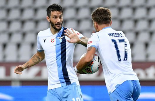 TURIN, ITALY - JUNE 30: Ciro Immobile of SS Lazio celebrates after scoring the first goal of his team with teammate Marco Parolo during the Serie A match between Torino FC and SS Lazio at Stadio Olimpico di Torino on June 30, 2020 in Turin, Italy. (Photo by Marco Rosi - SS Lazio/Getty Images) TURIN, ITALY - JUNE 30: Ciro Immobile of SS Lazio celebrates after scoring the first goal of his team with teammate Marco Parolo during the Serie A match between Torino FC and SS Lazio at Stadio Olimpico di Torino on June 30, 2020 in Turin, Italy. (Photo by Marco Rosi - SS Lazio/Getty Images)