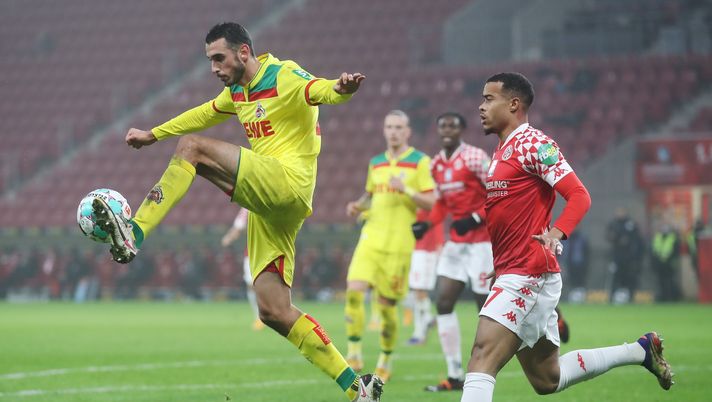 MAINZ, GERMANY - DECEMBER 12: Elleys Skhiri (L) of Koeln is challenged by Robin Quaison of Mainz during the Bundesliga match between 1. FSV Mainz 05 and 1. FC Koeln at Opel Arena on December 12, 2020 in Mainz, Germany. (Photo by Alex Grimm/Getty Images) MAINZ, GERMANY - DECEMBER 12: Elleys Skhiri (L) of Koeln is challenged by Robin Quaison of Mainz during the Bundesliga match between 1. FSV Mainz 05 and 1. FC Koeln at Opel Arena on December 12, 2020 in Mainz, Germany. (Photo by Alex Grimm/Getty Images)