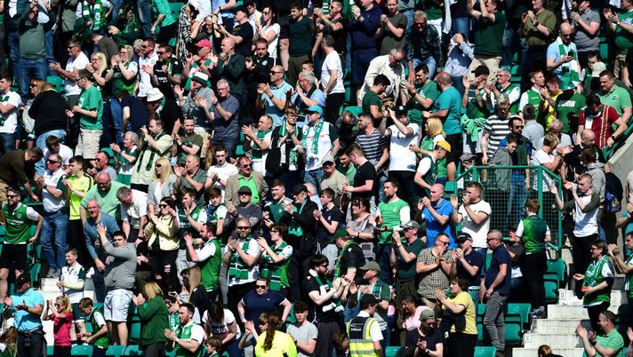 EDINBURGH, SCOTLAND - APRIL 21: Hibernian fans look on in the sunshine during the Ladbrokes Premiership match between Hibernian and Celtic at Easter Road on April 21, 2019 in Edinburgh, United Kingdom. (Photo by Mark Runnacles/Getty Images) EDINBURGH, SCOTLAND - APRIL 21: Hibernian fans look on in the sunshine during the Ladbrokes Premiership match between Hibernian and Celtic at Easter Road on April 21, 2019 in Edinburgh, United Kingdom. (Photo by Mark Runnacles/Getty Images)