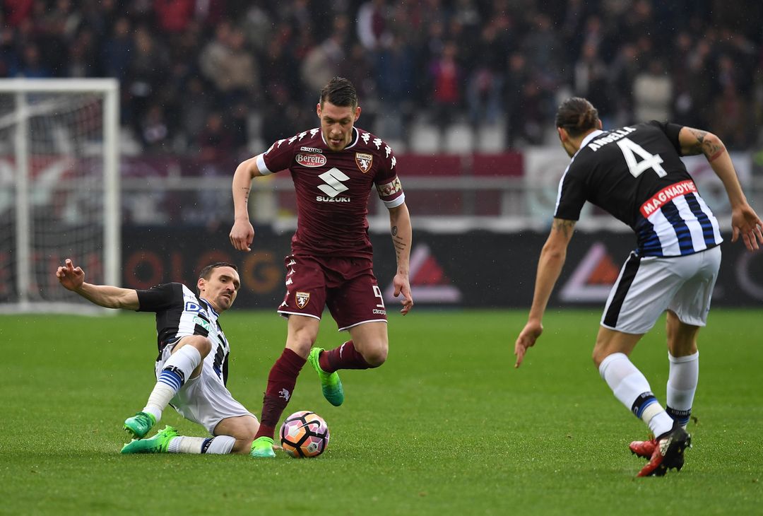  TURIN, ITALY - APRIL 02:  Andrea Belotti of FC Torino is tackled by Sven Kums (L) of Udinese Calcio during the Serie A match between FC Torino and Udinese Calcio at Stadio Olimpico di Torino on April 2, 2017 in Turin, Italy.  (Photo by Valerio Pennicino/Getty Images) 