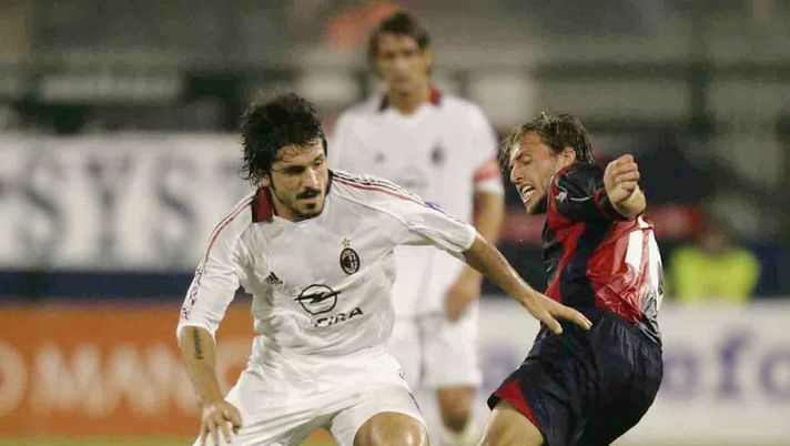 CAGLIARI, ITALY - OCTOBER 16:  Gennaro Ivan Gattuso of AC Milan competes with Alessandro Budel of Cagliari during the Seria A match between Cagliari and AC Milan at Sant Elia Stadium on October 16, 2005 in Cagliari, Italy. (Photo by New Press/Getty Images) 
