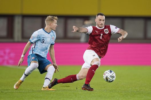 VIENNA, AUSTRIA - NOVEMBER 18: Marko Arnautovic of Austria is challenged by Andreas HancheOlsen of Norway during the UEFA Nations League group stage match between Austria and Norway at Ernst Happel Stadion on November 18, 2020 in Vienna, Austria. Football Stadiums around Europe remain empty due to the Coronavirus Pandemic as Government social distancing laws prohibit fans inside venues resulting in fixtures being played behind closed doors. (Photo by Christian Hofer/Getty Images) VIENNA, AUSTRIA - NOVEMBER 18: Marko Arnautovic of Austria is challenged by Andreas HancheOlsen of Norway during the UEFA Nations League group stage match between Austria and Norway at Ernst Happel Stadion on November 18, 2020 in Vienna, Austria. Football Stadiums around Europe remain empty due to the Coronavirus Pandemic as Government social distancing laws prohibit fans inside venues resulting in fixtures being played behind closed doors. (Photo by Christian Hofer/Getty Images)