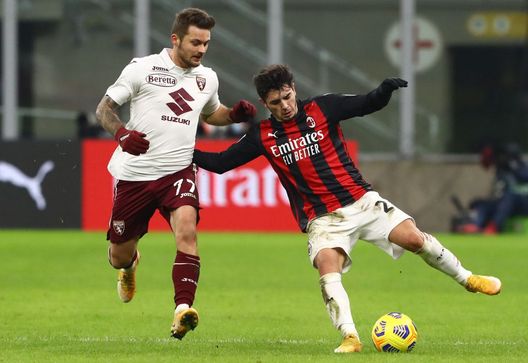 MILAN, ITALY - JANUARY 12: Brahim Diaz of A.C. Milan is challenged by Karol Linetty of Torino F.C. during the Coppa Italia match between AC Milan and Torino FC at Stadio Giuseppe Meazza on January 12, 2021 in Milan, Italy. Sporting stadiums around Italy remain under strict restrictions due to the Coronavirus Pandemic as Government social distancing laws prohibit fans inside venues resulting in games being played behind closed doors. (Photo by Marco Luzzani/Getty Images) MILAN, ITALY - JANUARY 12: Brahim Diaz of A.C. Milan is challenged by Karol Linetty of Torino F.C. during the Coppa Italia match between AC Milan and Torino FC at Stadio Giuseppe Meazza on January 12, 2021 in Milan, Italy. Sporting stadiums around Italy remain under strict restrictions due to the Coronavirus Pandemic as Government social distancing laws prohibit fans inside venues resulting in games being played behind closed doors. (Photo by Marco Luzzani/Getty Images)