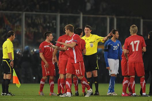 GENOA, ITALY - OCTOBER 12: Referee Craig A. Thompson (C) suspends the Uefa Euro 2012 qualifying match between Italy and Serbia at Luigi Ferraris Stadium on October 12, 2010 in Genoa, Italy. (Photo by Valerio Pennicino/Getty Images) GENOA, ITALY - OCTOBER 12: Referee Craig A. Thompson (C) suspends the Uefa Euro 2012 qualifying match between Italy and Serbia at Luigi Ferraris Stadium on October 12, 2010 in Genoa, Italy. (Photo by Valerio Pennicino/Getty Images)