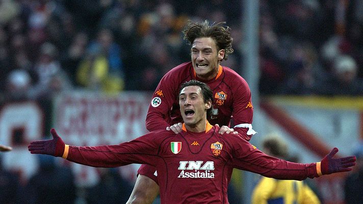 9 Dec 2001: Diego Fuser of Roma celebrates the goal with team mate Francesco Totti during the Serie A 14th Round League match between Parma and Roma, played at the Ennio Tardini Stadium in Parma Italy. DIGITAL IMAGE. Mandatory Credit: Grazia Neri/ALLSPORT 9 Dec 2001: Diego Fuser of Roma celebrates the goal with team mate Francesco Totti during the Serie A 14th Round League match between Parma and Roma, played at the Ennio Tardini Stadium in Parma Italy. DIGITAL IMAGE. Mandatory Credit: Grazia Neri/ALLSPORT