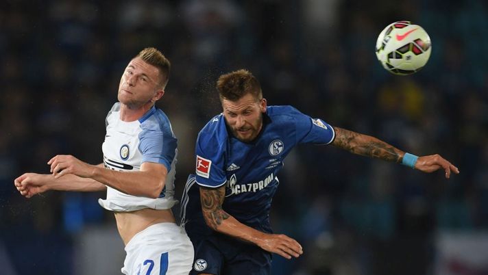 CHANGZHOU, CHINA - JULY 21: Milan Skriniar of FC Internazionale (L) and Guido Burgstaller of FC Schalke 04 compete for the ball during the pre-season friendly match between FC Internazionale and FC Schalke 04 at Olympic Stadium on July 21, 2017 in Changzhou, China. (Photo by Claudio Villa - Inter/Inter via Getty Images) CHANGZHOU, CHINA - JULY 21: Milan Skriniar of FC Internazionale (L) and Guido Burgstaller of FC Schalke 04 compete for the ball during the pre-season friendly match between FC Internazionale and FC Schalke 04 at Olympic Stadium on July 21, 2017 in Changzhou, China. (Photo by Claudio Villa - Inter/Inter via Getty Images)