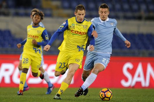 ROME, ROMA - JANUARY 28: Sergej Milinkovic Savic of SS Lazio compete for the ball with Walter Birsa of AC Chievo Verona during the Serie A match between SS Lazio and AC ChievoVerona at Stadio Olimpico on January 28, 2017 in Rome, Italy. (Photo by Marco Rosi/Getty Images) ROME, ROMA - JANUARY 28: Sergej Milinkovic Savic of SS Lazio compete for the ball with Walter Birsa of AC Chievo Verona during the Serie A match between SS Lazio and AC ChievoVerona at Stadio Olimpico on January 28, 2017 in Rome, Italy. (Photo by Marco Rosi/Getty Images)