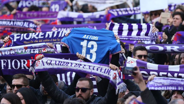 Fans gather in Piazza della Signoria during a funeral service for Davide Astori  