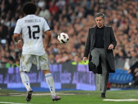MADRID, SPAIN - FEBRUARY 06: Head coach Jose Mourinho of Real Madrid kicks the ball back during the La Liga match between Real Madrid and Real Sociedad at Estadio Santiago Bernabeu on February 6, 2011 in Madrid, Spain. (Photo by Denis Doyle/Getty Images) MADRID, SPAIN - FEBRUARY 06: Head coach Jose Mourinho of Real Madrid kicks the ball back during the La Liga match between Real Madrid and Real Sociedad at Estadio Santiago Bernabeu on February 6, 2011 in Madrid, Spain. (Photo by Denis Doyle/Getty Images)