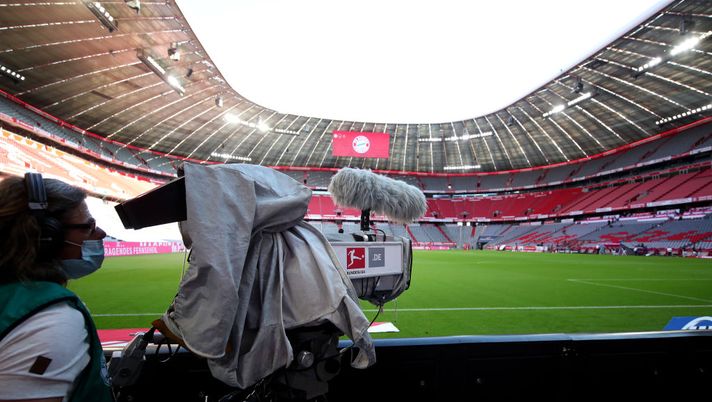 MUNICH, GERMANY - JUNE 13: A TV Cameraman is seen working inside the stadium prior to the Bundesliga match between FC Bayern Muenchen and Borussia Moenchengladbach at Allianz Arena on June 13, 2020 in Munich, Germany. (Photo by Alexander Hassenstein/Getty Images) 