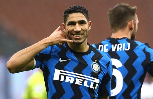 MILAN, ITALY - DECEMBER 20: Achraf Hakimi of FC Internazionale celebrates after scoring the opening goal during the Serie A match between FC Internazionale and Spezia Calcio at Stadio Giuseppe Meazza on December 20, 2020 in Milan, Italy. (Photo by Marco Luzzani/Inter via Getty Images) MILAN, ITALY - DECEMBER 20: Achraf Hakimi of FC Internazionale celebrates after scoring the opening goal during the Serie A match between FC Internazionale and Spezia Calcio at Stadio Giuseppe Meazza on December 20, 2020 in Milan, Italy. (Photo by Marco Luzzani/Inter via Getty Images)
