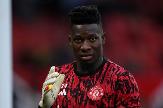 MANCHESTER, ENGLAND - AUGUST 14: André Onana of Manchester United warms up ahead of the Premier League match between Manchester United and Wolverhampton Wanderers at Old Trafford on August 14, 2023 in Manchester, England. (Photo by Gareth Copley/Getty Images)  Manchester United Fulham