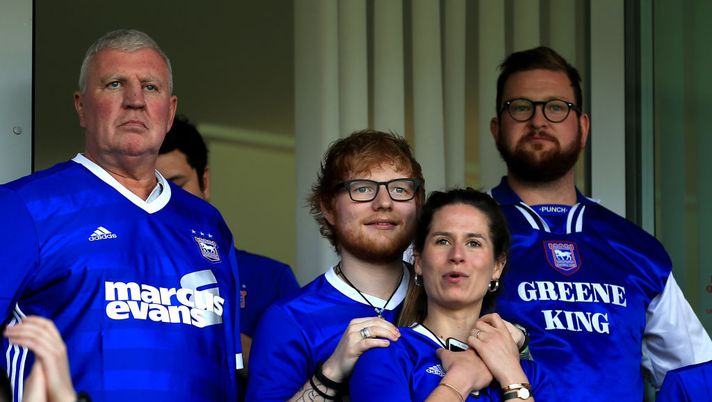 IPSWICH, ENGLAND - APRIL 21:  Musician Ed Sheeran and fiance Cherry Seaborn look on during the Sky Bet Championship match between Ipswich Town and Aston Villa at Portman Road on April 21, 2018 in Ipswich, England. (Photo by Stephen Pond/Getty Images) 