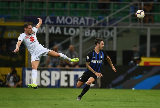MILAN, ITALY - AUGUST 26: Sime Vrsaljko of FC Internazionale ( L) competes for the ball with Andrea Belotti of Torino FC during the serie A match between FC Internazionale and Torino FC at Stadio Giuseppe Meazza on August 26, 2018 in Milan, Italy. (Photo by Claudio Villa - Inter/Inter via Getty Images) MILAN, ITALY - AUGUST 26: Sime Vrsaljko of FC Internazionale ( L) competes for the ball with Andrea Belotti of Torino FC during the serie A match between FC Internazionale and Torino FC at Stadio Giuseppe Meazza on August 26, 2018 in Milan, Italy. (Photo by Claudio Villa - Inter/Inter via Getty Images)