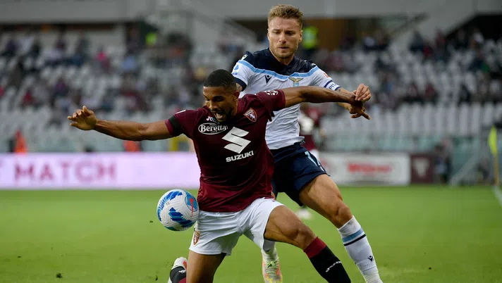 TURIN, ITALY - SEPTEMBER 23: Ciro Immobile of SS Lazio competes for the ball with Gleison Bremer of Torino FC during the Serie A match between Torino FC v SS Lazio at Stadio Olimpico di Torino on September 23, 2021 in Turin, Italy. (Photo by Marco Rosi - SS Lazio/Getty Images)