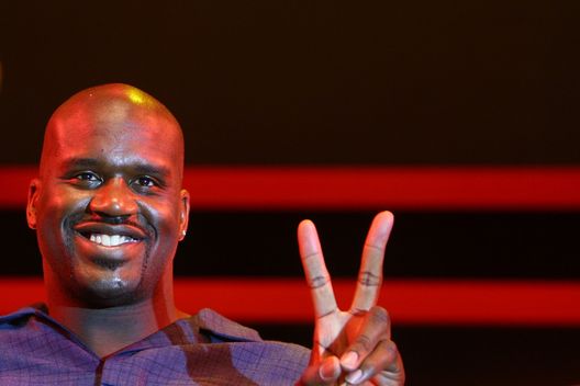 BEIJING, CHINA - AUGUST 14: (CHINA OUT) Shaquille O'Neal of the NBA World Champion Miami Heat shows victory sign as he attends a press conference to promote a Chinese sports brand on August 14, 2006 in Beijing, China. (Photo by China Photos/Getty Images) BEIJING, CHINA - AUGUST 14: (CHINA OUT) Shaquille O'Neal of the NBA World Champion Miami Heat shows victory sign as he attends a press conference to promote a Chinese sports brand on August 14, 2006 in Beijing, China. (Photo by China Photos/Getty Images)