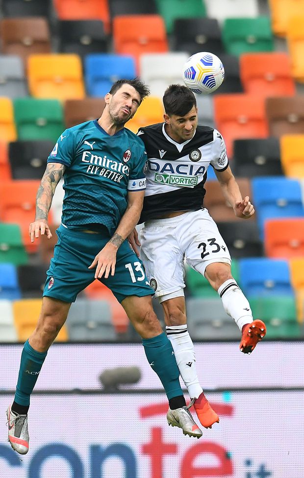 UDINE, ITALY - NOVEMBER 01: Alessio Romagnoli of AC Milan competes for the ball with Ignacio Pussetto of Udinese Calcio during the Serie A match between Udinese Calcio and AC Milan at Dacia Arena on November 01, 2020 in Udine, Italy. (Photo by Alessandro Sabattini/Getty Images) UDINE, ITALY - NOVEMBER 01: Alessio Romagnoli of AC Milan competes for the ball with Ignacio Pussetto of Udinese Calcio during the Serie A match between Udinese Calcio and AC Milan at Dacia Arena on November 01, 2020 in Udine, Italy. (Photo by Alessandro Sabattini/Getty Images)