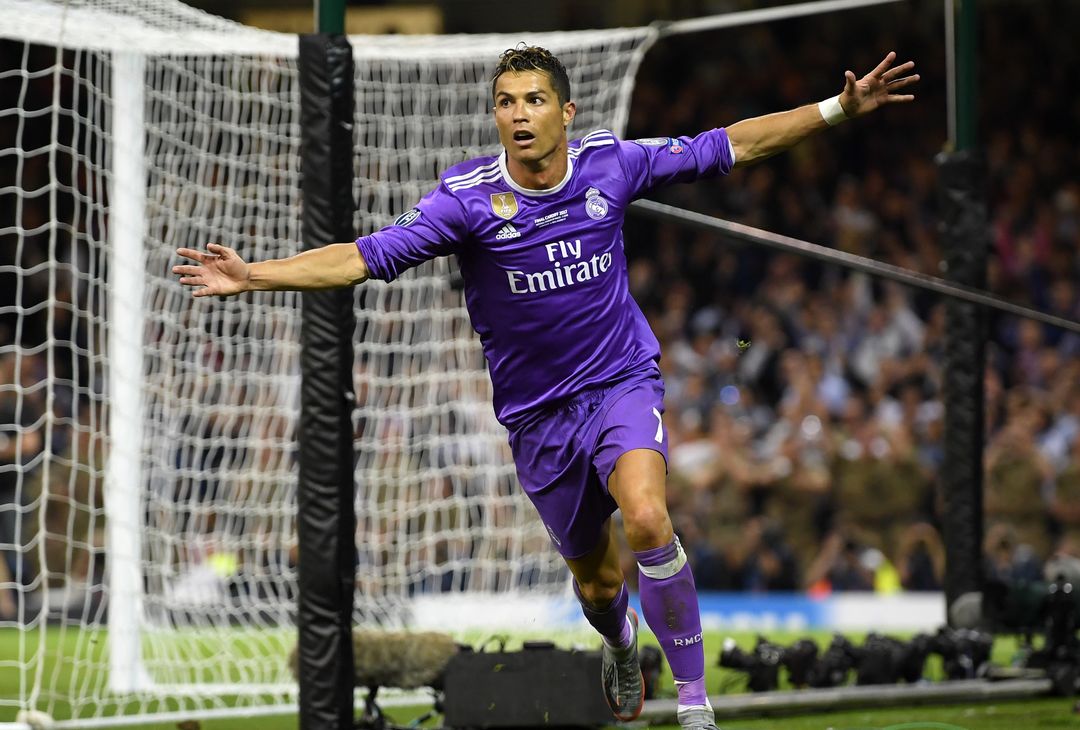  CARDIFF, WALES - JUNE 03:  Cristiano Ronaldo of Real Madrid celebrates scoring his sides third goal  during the UEFA Champions League Final between Juventus and Real Madrid at National Stadium of Wales on June 3, 2017 in Cardiff, Wales.  (Photo by Matthias Hangst/Getty Images) 