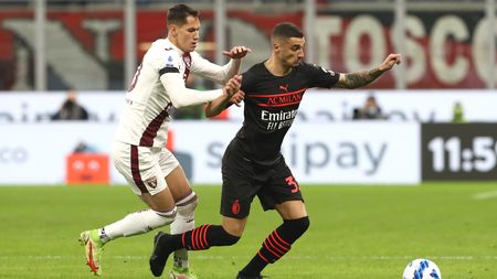 MILAN, ITALY - OCTOBER 26: Rade Krunic of AC Milan is challenged by Sasa Lukic of Torino FC during the Serie A match between AC Milan and Torino FC at Stadio Giuseppe Meazza on October 26, 2021 in Milan, Italy. (Photo by Marco Luzzani/Getty Images)