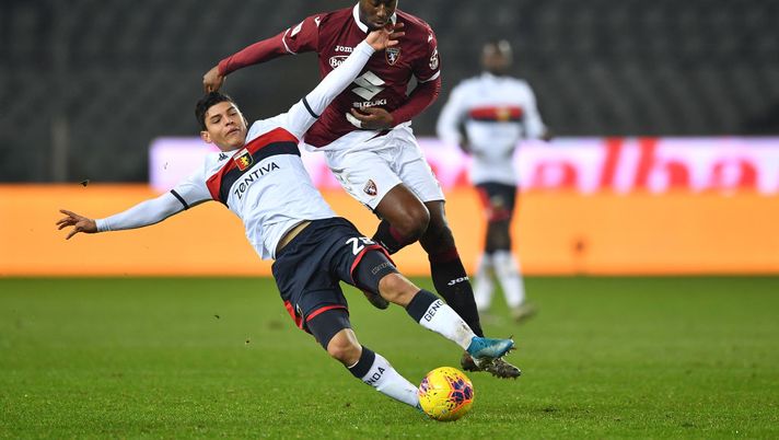 TURIN, ITALY - JANUARY 09:  Nicolas Nkoulou (R) of Torino FC tackles Kevin Agudello of Genoa CFC during the Coppa Italia match between Torino FC and Genoa CFC at Stadio Olimpico Grande Torino on January 9, 2020 in Turin, Italy.  (Photo by Valerio Pennicino/Getty Images) 