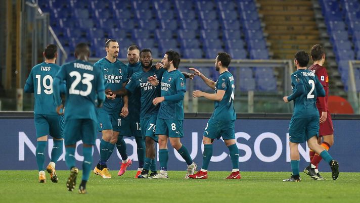 ROME, ITALY - FEBRUARY 28: Franck Kessie of AC Milan celebrates with Zlatan Ibrahimovic and team mates after scoring their side's first goal from the penalty spot during the Serie A match between AS Roma and AC Milan at Stadio Olimpico on February 28, 2021 in Rome, Italy. Sporting stadiums around Italy remain under strict restrictions due to the Coronavirus Pandemic as Government social distancing laws prohibit fans inside venues resulting in games being played behind closed doors. (Photo by Paolo Bruno/Getty Images) ROME, ITALY - FEBRUARY 28: Franck Kessie of AC Milan celebrates with Zlatan Ibrahimovic and team mates after scoring their side's first goal from the penalty spot during the Serie A match between AS Roma and AC Milan at Stadio Olimpico on February 28, 2021 in Rome, Italy. Sporting stadiums around Italy remain under strict restrictions due to the Coronavirus Pandemic as Government social distancing laws prohibit fans inside venues resulting in games being played behind closed doors. (Photo by Paolo Bruno/Getty Images)