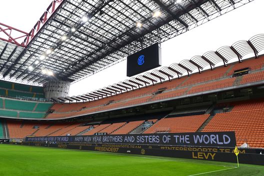 MILAN, ITALY - JANUARY 03: General view inside the stadium as a Happy New Year message is displayed in the LED boards prior to the Serie A match between FC Internazionale and FC Crotone at Stadio Giuseppe Meazza on January 03, 2021 in Milan, Italy. Sporting stadiums around Italy remain under strict restrictions due to the Coronavirus Pandemic as Government social distancing laws prohibit fans inside venues resulting in games being played behind closed doors. (Photo by Marco Luzzani/Getty Images) MILAN, ITALY - JANUARY 03: General view inside the stadium as a Happy New Year message is displayed in the LED boards prior to the Serie A match between FC Internazionale and FC Crotone at Stadio Giuseppe Meazza on January 03, 2021 in Milan, Italy. Sporting stadiums around Italy remain under strict restrictions due to the Coronavirus Pandemic as Government social distancing laws prohibit fans inside venues resulting in games being played behind closed doors. (Photo by Marco Luzzani/Getty Images)