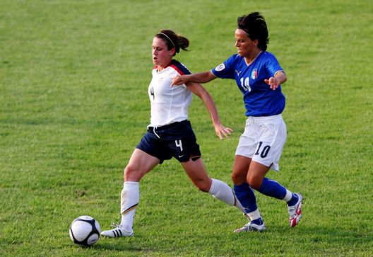 SUWON, SOUTH KOREA - JUNE 19: Heather O'reilly of USA and Tatiana Zorri of Italy vie for the ball during the 2008 Queen Peace Cup match between the United States of America and Italy at the Suwon Sports Complex on June 19, 2008 in Suwon, South Korea. USA won 2:0. (Photo by Chung Sung-Jun/Getty Images) 